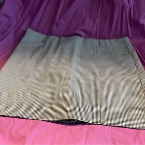 Women’s Attyre skort size 12 petite. Black-and-white check.